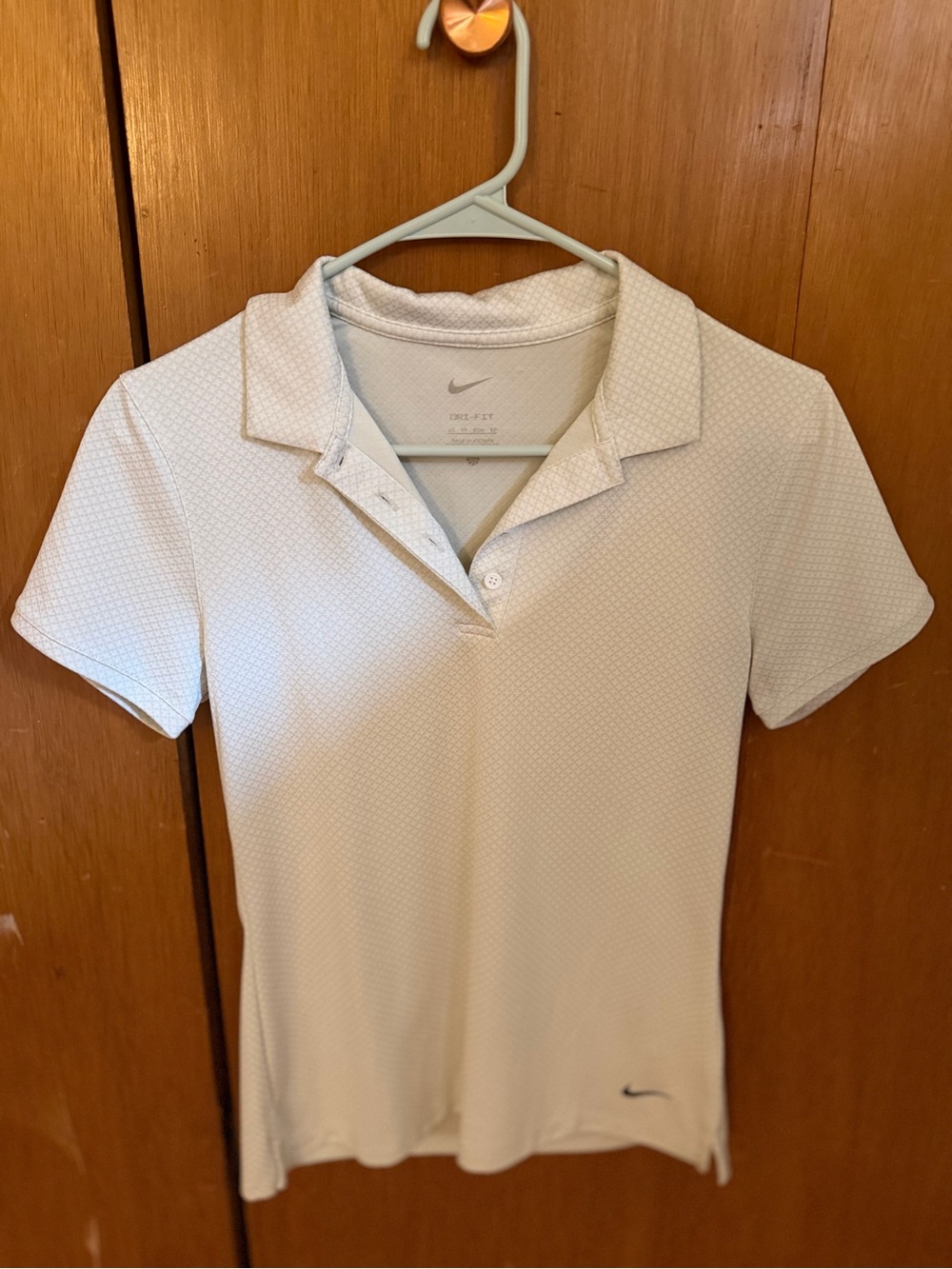 Nike Women's Light Blue Polo Top
